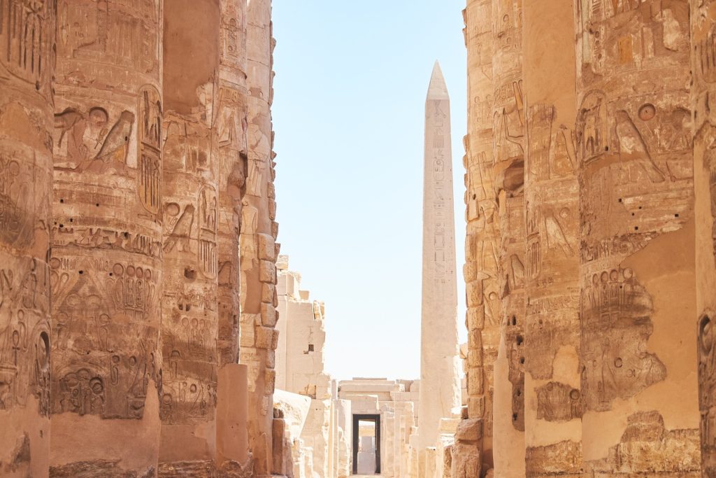 Karnak temples complex in Luxor - ancient Thebes. Pillars with Egyptian hieroglyphs